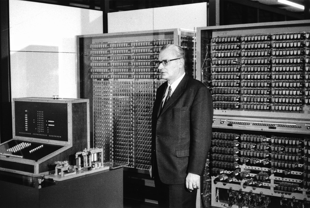 Image of Konrad Zuse with a reconstruction of the Z3 computer.