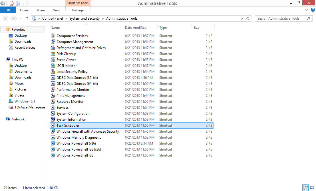 The Task Scheduler application highlighted in the Administrative Tools window pane
